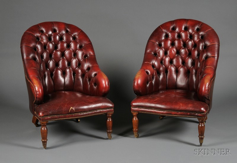 Appraisal: Pair of Victorian Walnut and Tufted Leather-upholstered Bergeres c each