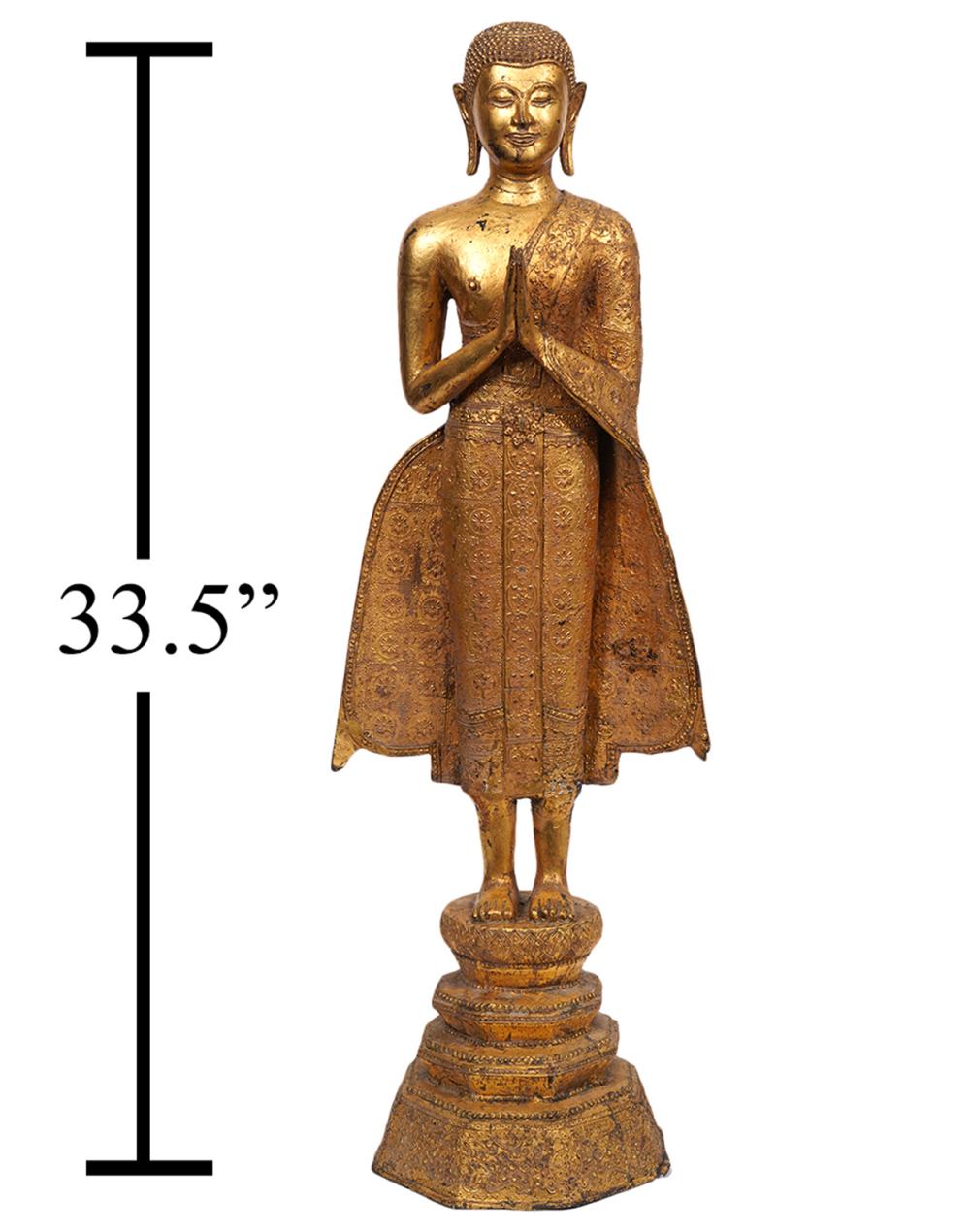 Appraisal: LARGE GILT METAL BUDDHA FIGURINELarge gilt metal standing buddha with