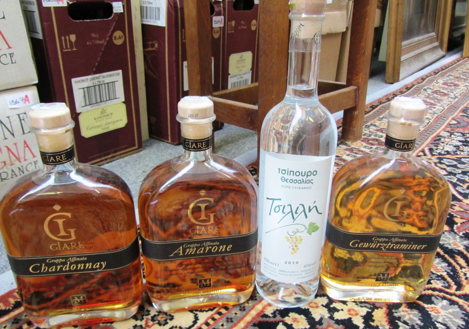 Appraisal: Twelve bottles of mixed port whiskey rum and others comprising