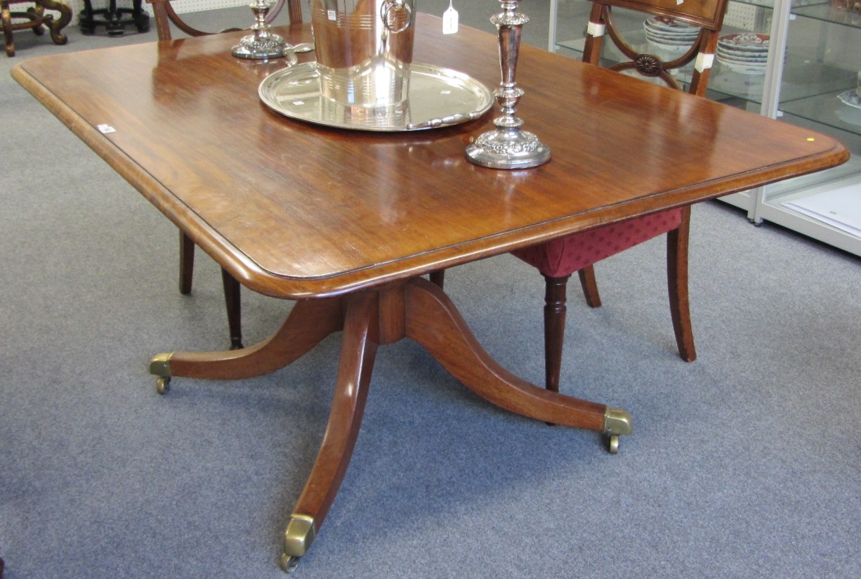 Appraisal: A George III mahogany rectangular snap top breakfast table on