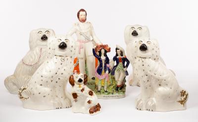 Appraisal: Two pairs of Staffordshire dogs a single dog a figure