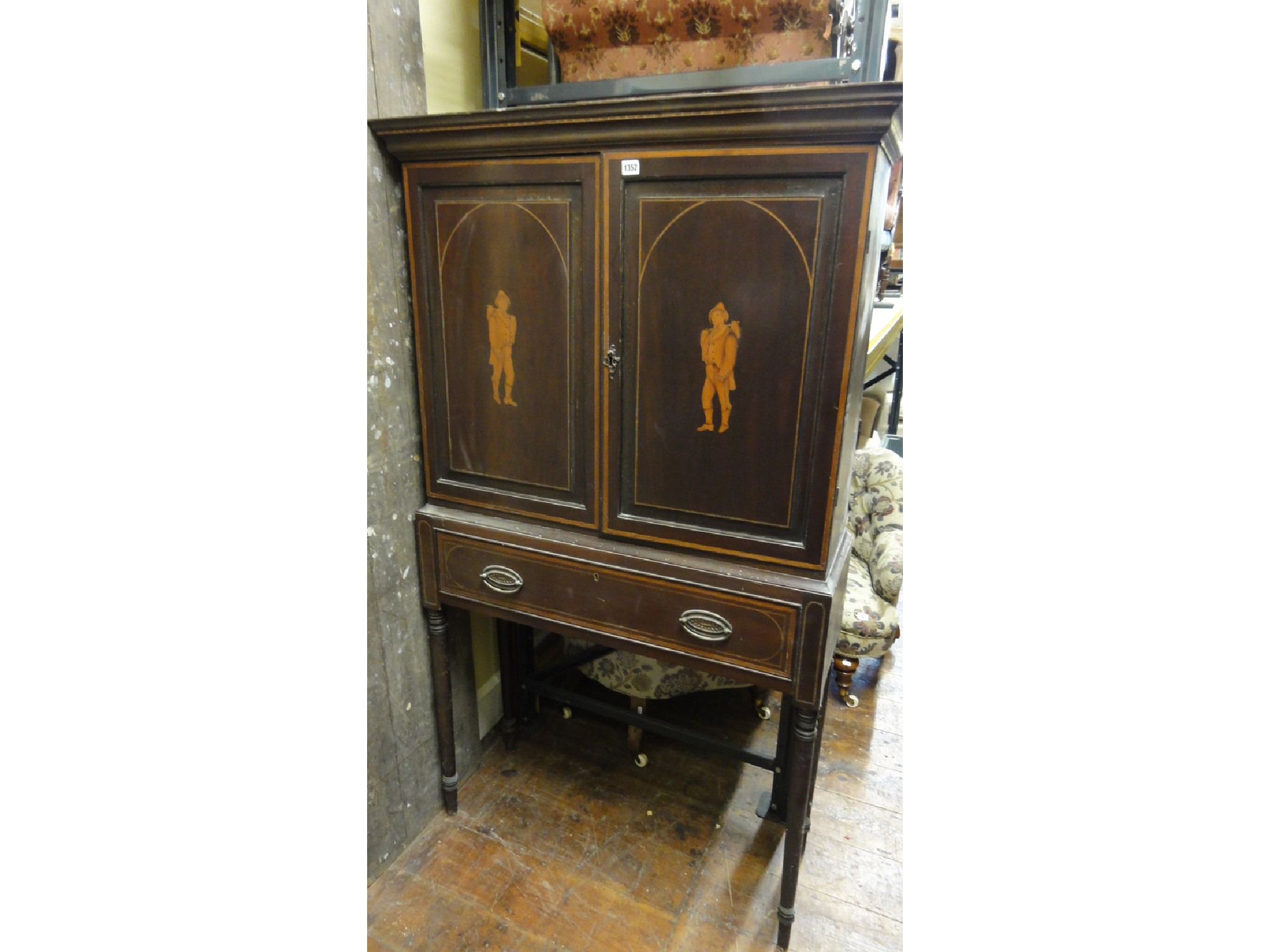 Appraisal: A th century mahogany cabinet on stand the upper section