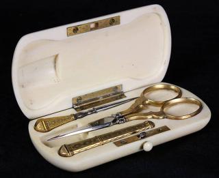 Appraisal: Cased parcel gilt lady's sewing kit circa possibly French having