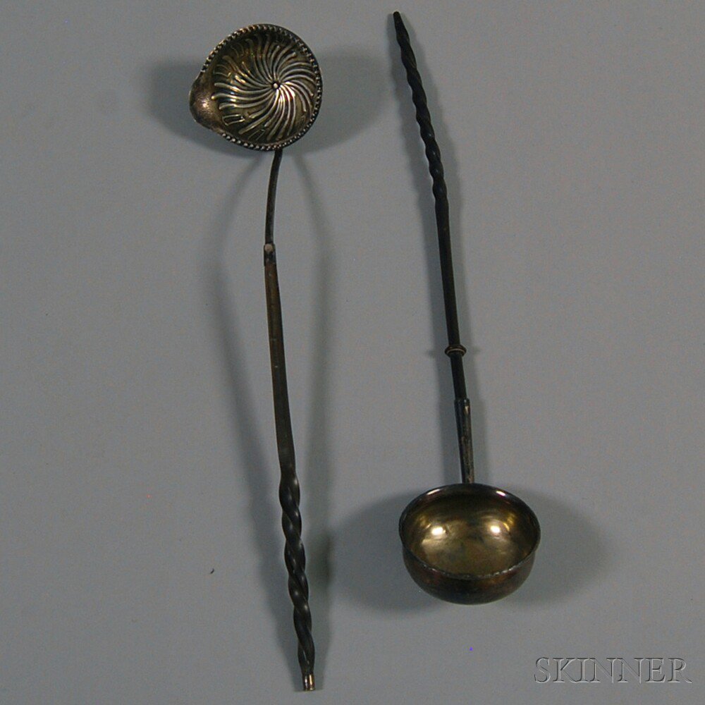 Appraisal: Two Toddy Ladles with sterling silver bowls and twisted handles