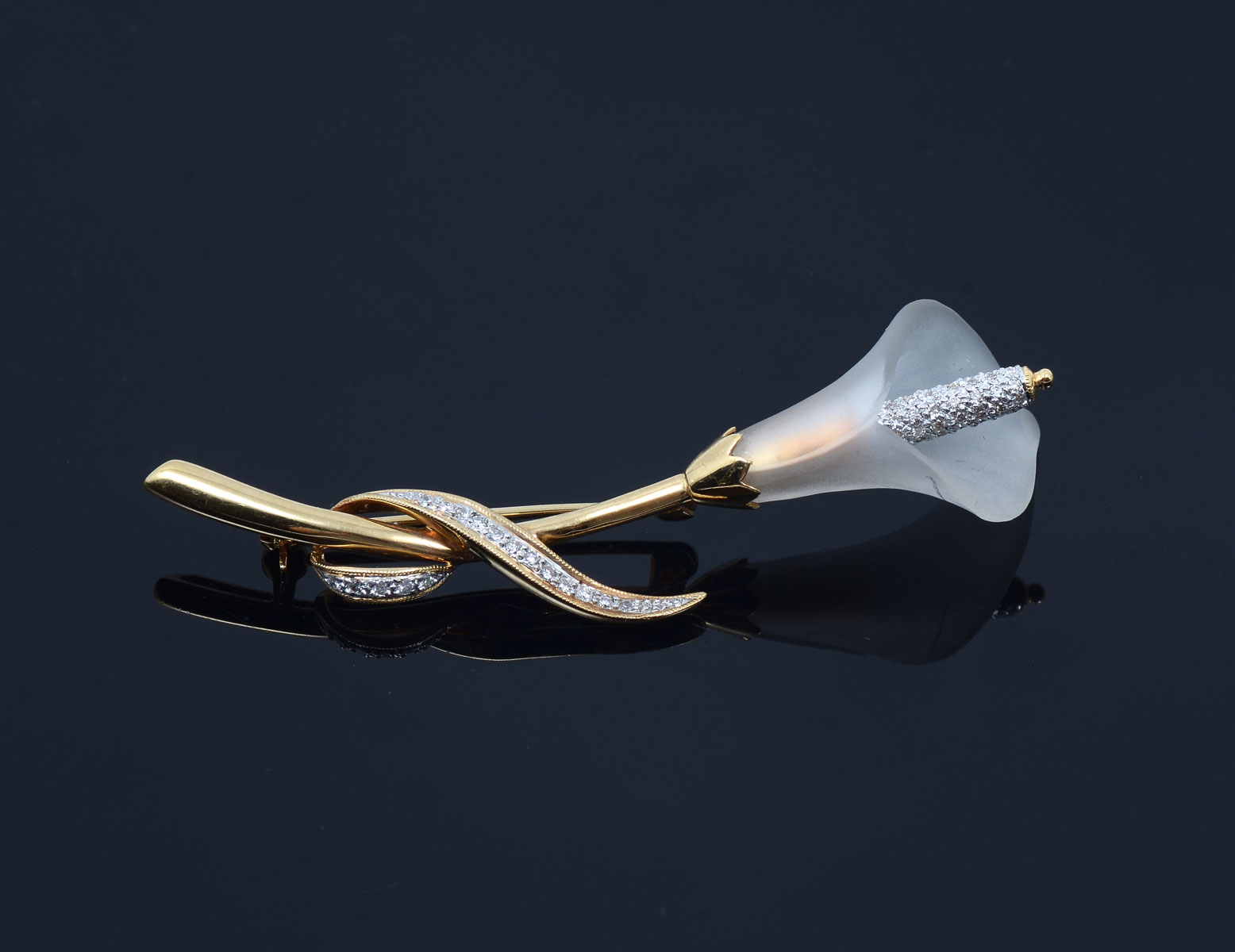 Appraisal: K DIAMOND QUARTZ LILY BROOCH White quartz forms the simple