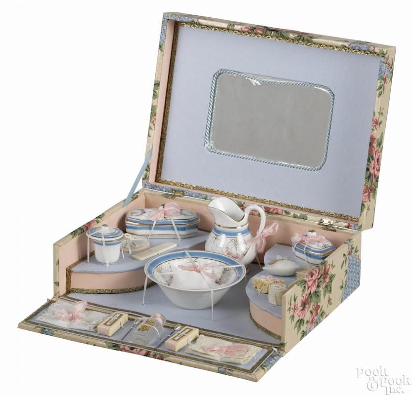 Appraisal: French doll's toilette set in a presentation box complete with