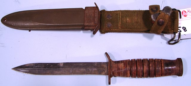 Appraisal: Lot consists of a WWII US Model M- fighting knife