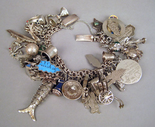 Appraisal: Sterling silver charm bracelet with charms ozt together with a