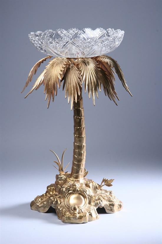 Appraisal: CONTINENTAL GILT-METAL PALM TREE-FORM CENTERPIECE th century Shaped rocky base