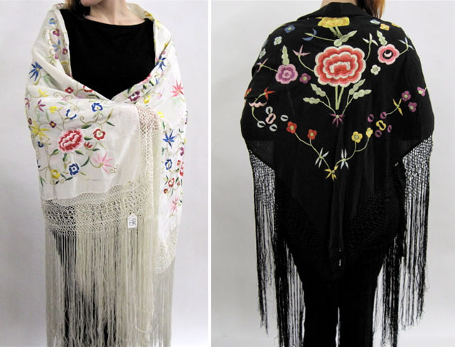 Appraisal: TWO EMBROIDERED SHAWLS One has colorful flowers on white ground