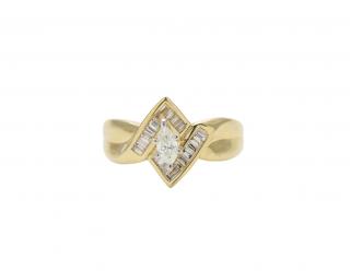 Appraisal: A MARQUISE DIAMOND RING A MARQUISE DIAMOND RING Set in