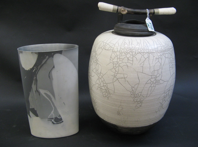 Appraisal: TWO PIECES RAIKU POTTERY a handled white crackle glaze receptacle