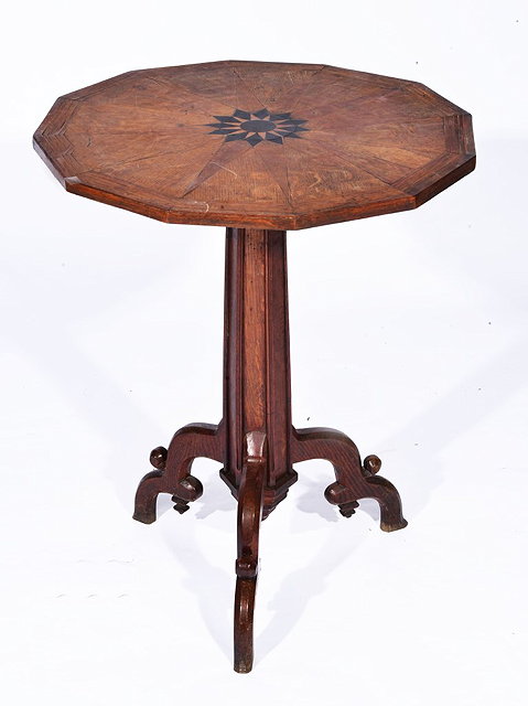 Appraisal: A GOTHIC OAK TWELVE SIDED OCCASIONAL TABLE with segmented top