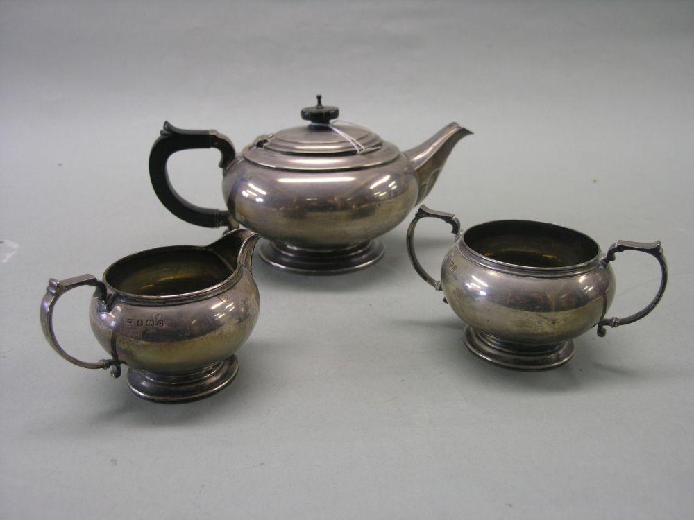 Appraisal: A silver tea set consisting of circular teapot squat form