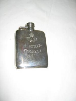 Appraisal: A HIP FLASK of rounded oblong form with screw-off lid