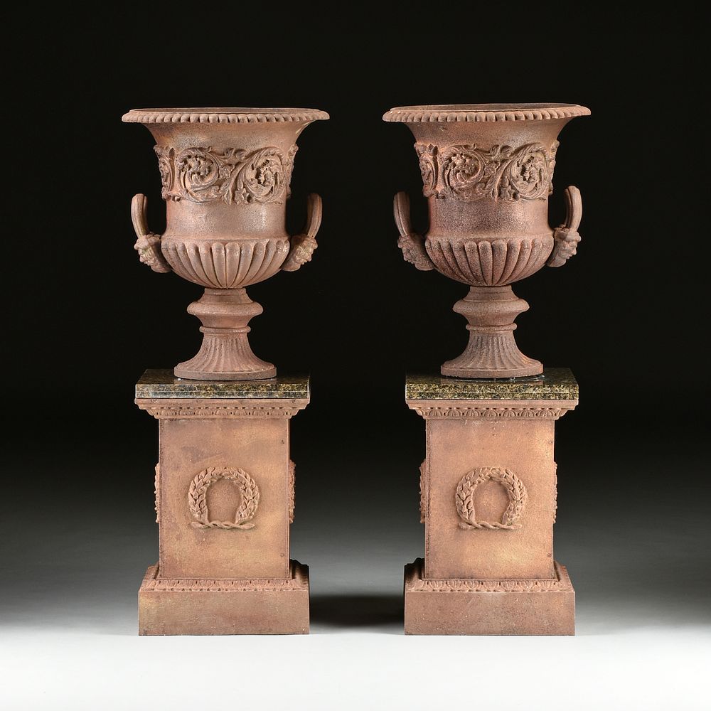 Appraisal: A PAIR OF VICTORIAN CAST IRON URN JARDINI RES AND