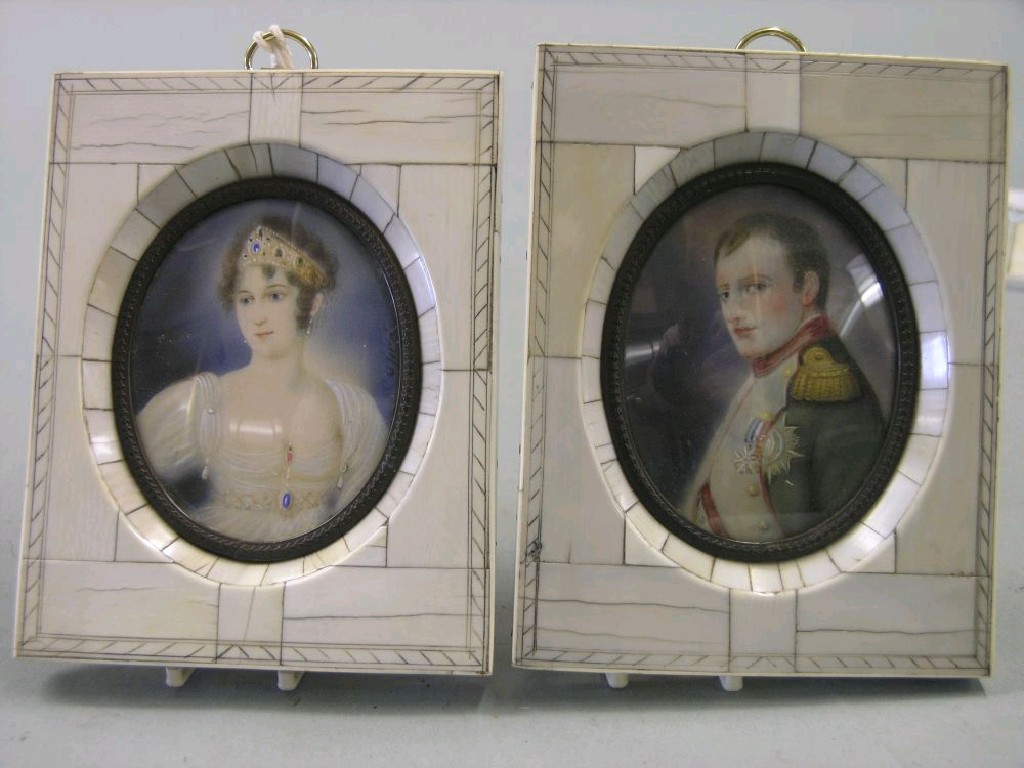 Appraisal: A pair of portrait miniatures within ivory frames portrait busts