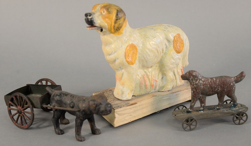 Appraisal: Three dog toys to include tin pull toy irondog pulling