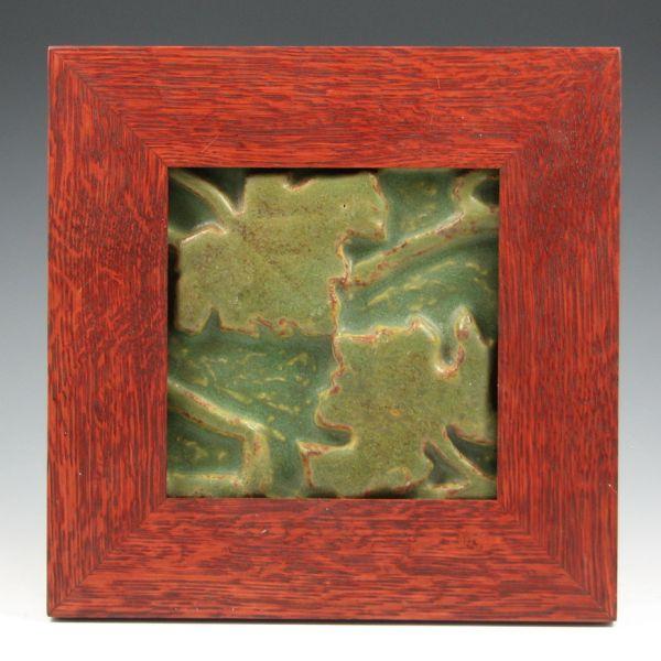 Appraisal: Rookwood Faience tile in matte green and brown of oak