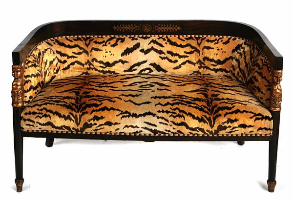 Appraisal: An Empire style ebonized and parcel gilt settee height in