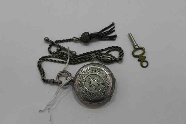 Appraisal: A CONTINENTAL WHITE METAL POCKET WATCH with key wound mechanism