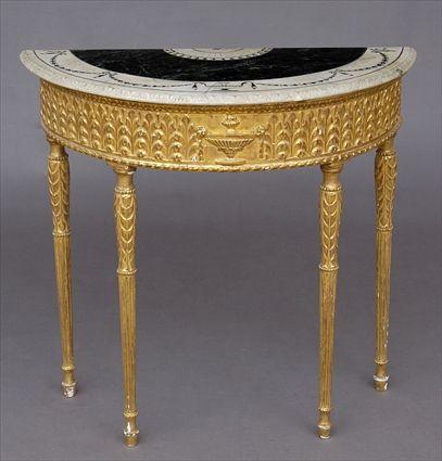 Appraisal: GEORGE III STYLE CARVED GILTWOOD CONSOLE TABLE The d-shape inlaid