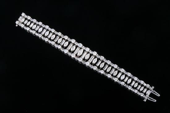 Appraisal: PLATINUM AND DIAMOND OPENWORK FLEXIBLE-LINK BRACELET graduated brilliant-cut round diamonds