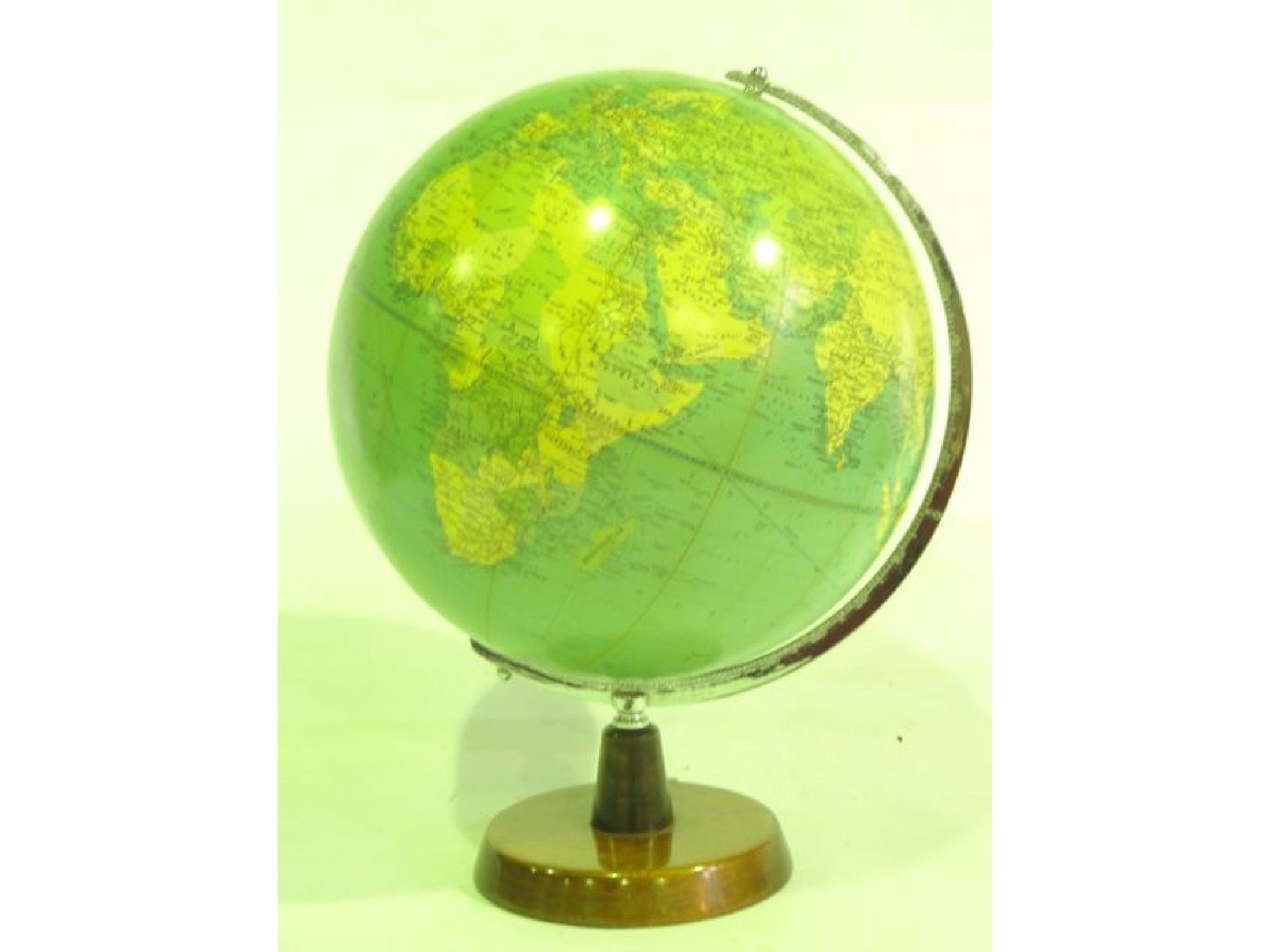 Appraisal: A vintage table top globe with a chromium axis supported