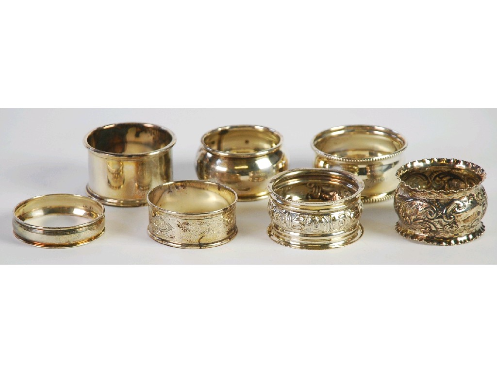 Appraisal: SEVEN VICTORIAN AND LATER SILVER NAPKIN RINGS Comprising FOUR PLAIN