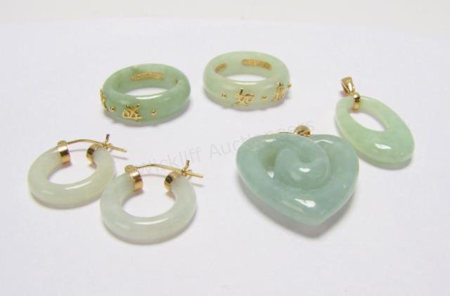 Appraisal: Five Jade and K yellow gold jewelry items including a