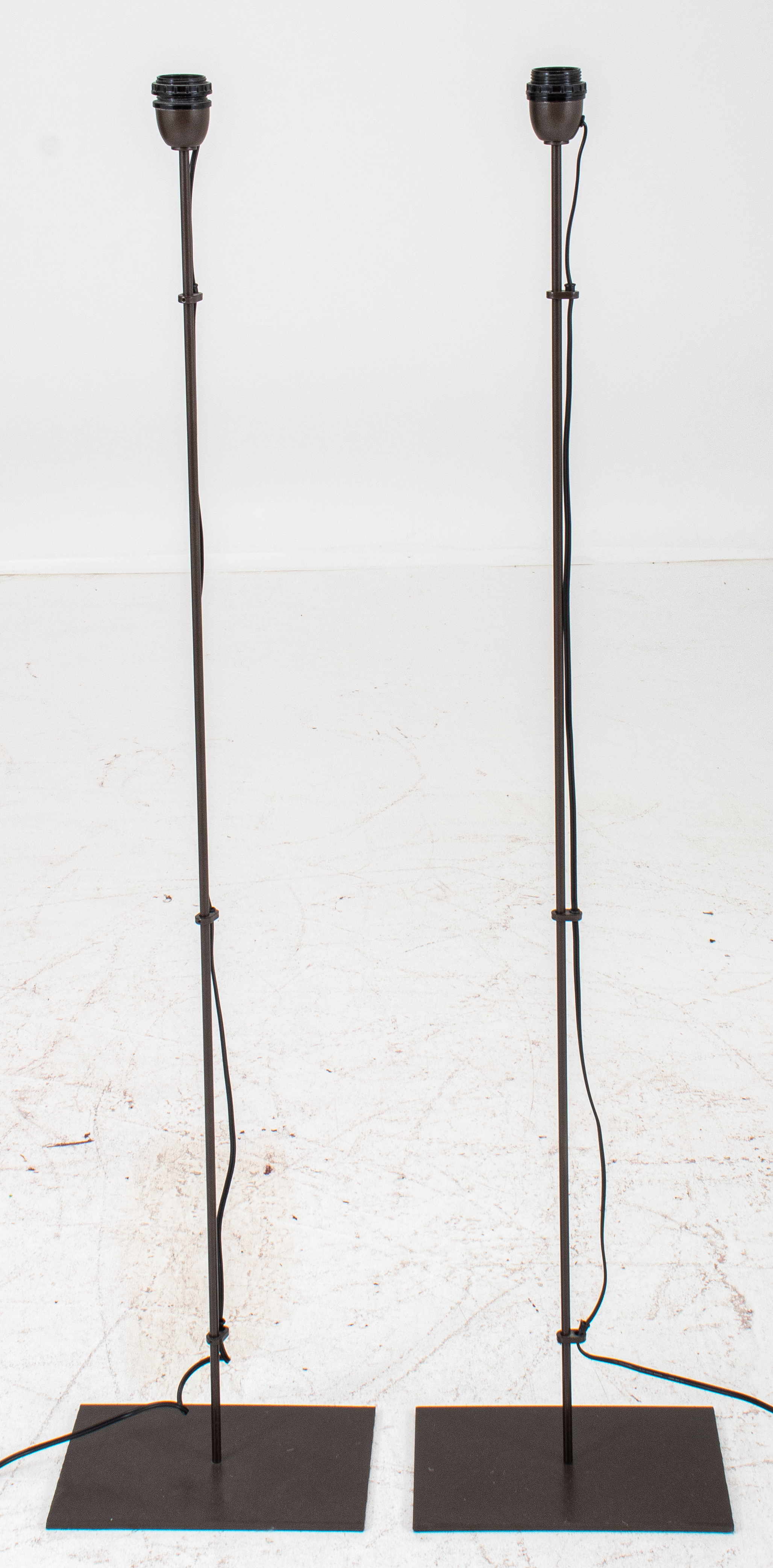 Appraisal: CHRISTIAN LIAIGRE ACIER FLOOR LAMPS PAIR Christian Liaigre Acier floor