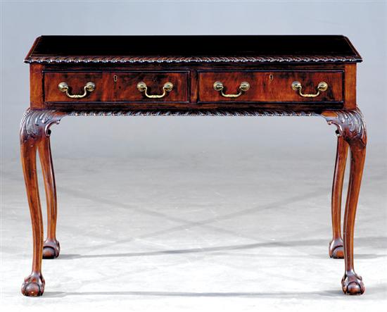 Appraisal: English Chippendale style carved mahogany side table circa rectangular form