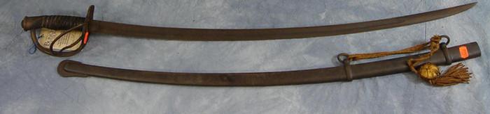 Appraisal: C W Light Cavalry sabre curved blade in iron scabbard