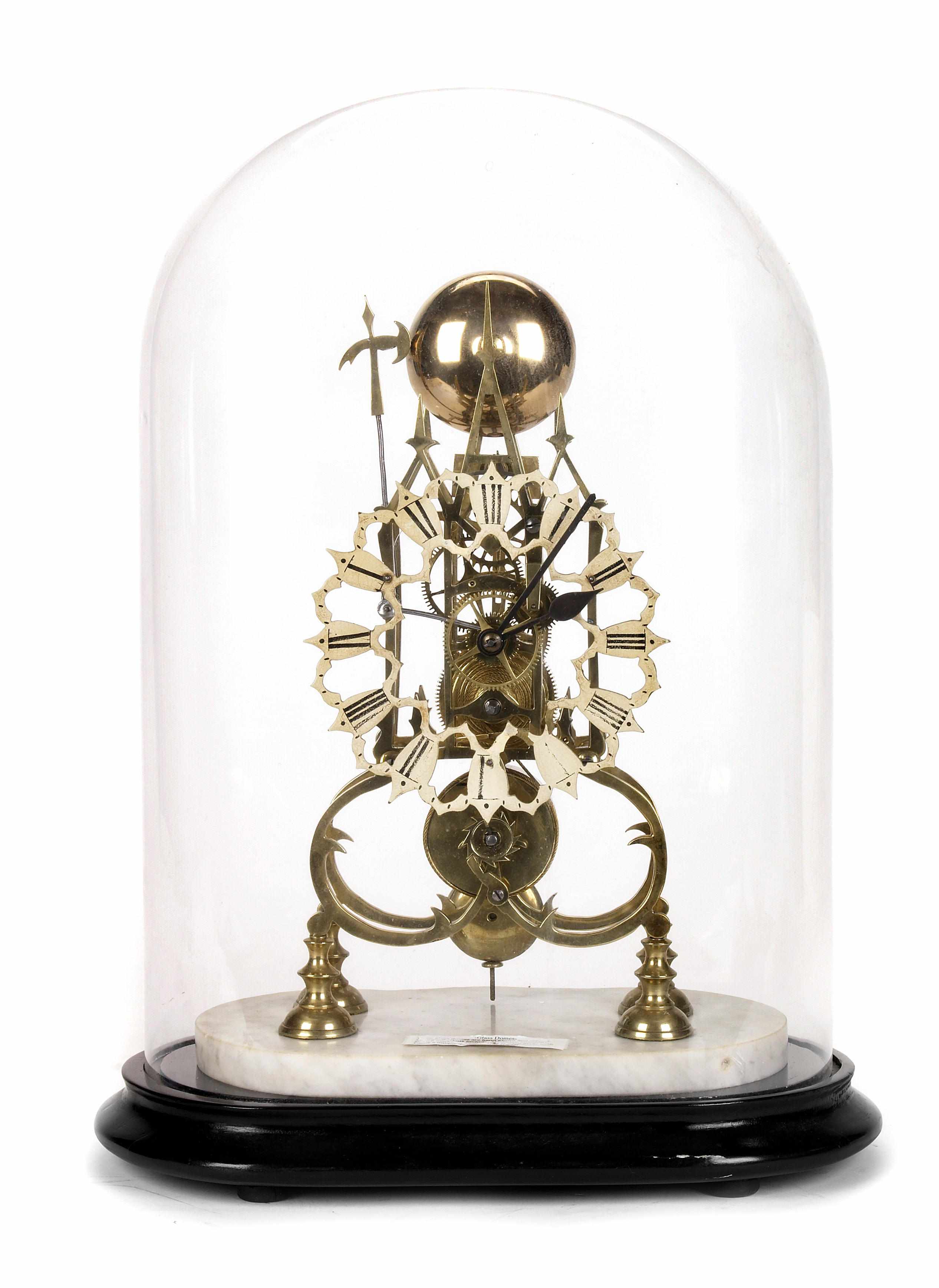 Appraisal: An English brass skeleton timepiece with single free movement and