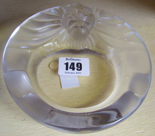 Appraisal: A modern Lalique glass ashtray modelled with a lion mask