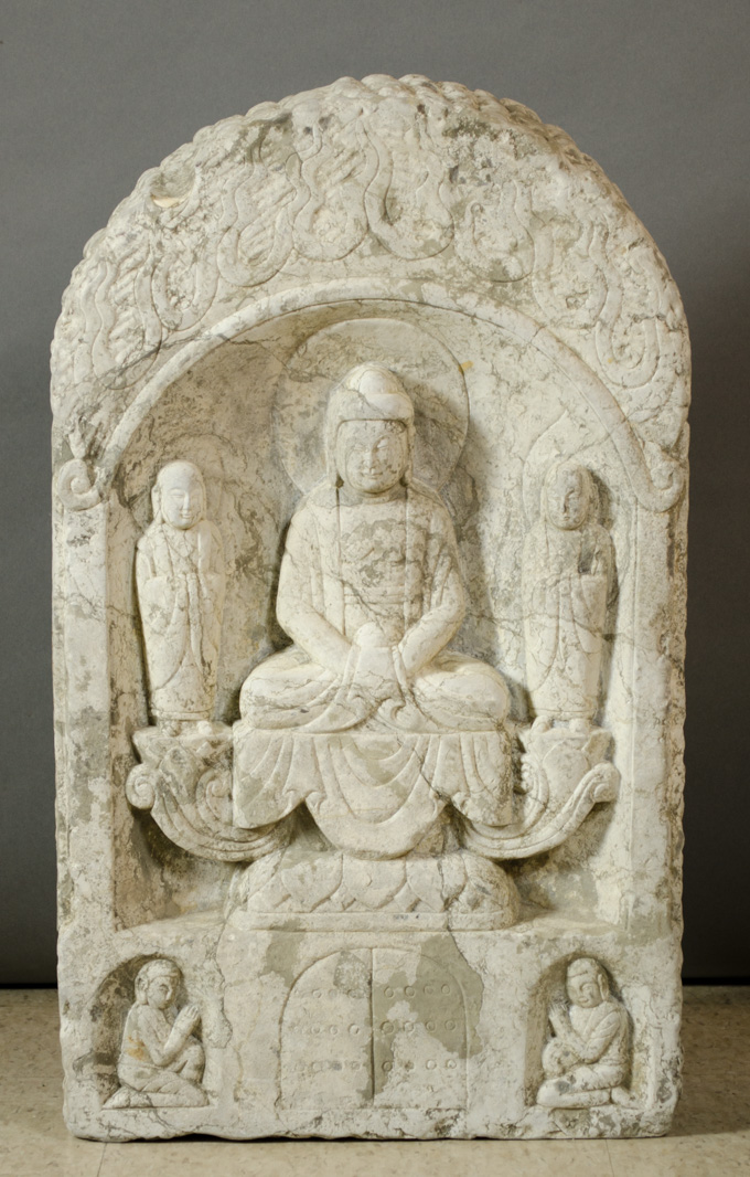 Appraisal: CHINESE BUDDHIST VOTIVE STELE featuring a shallow niche with a