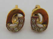 Appraisal: An carat yellow gold and diamond clip earrings the open