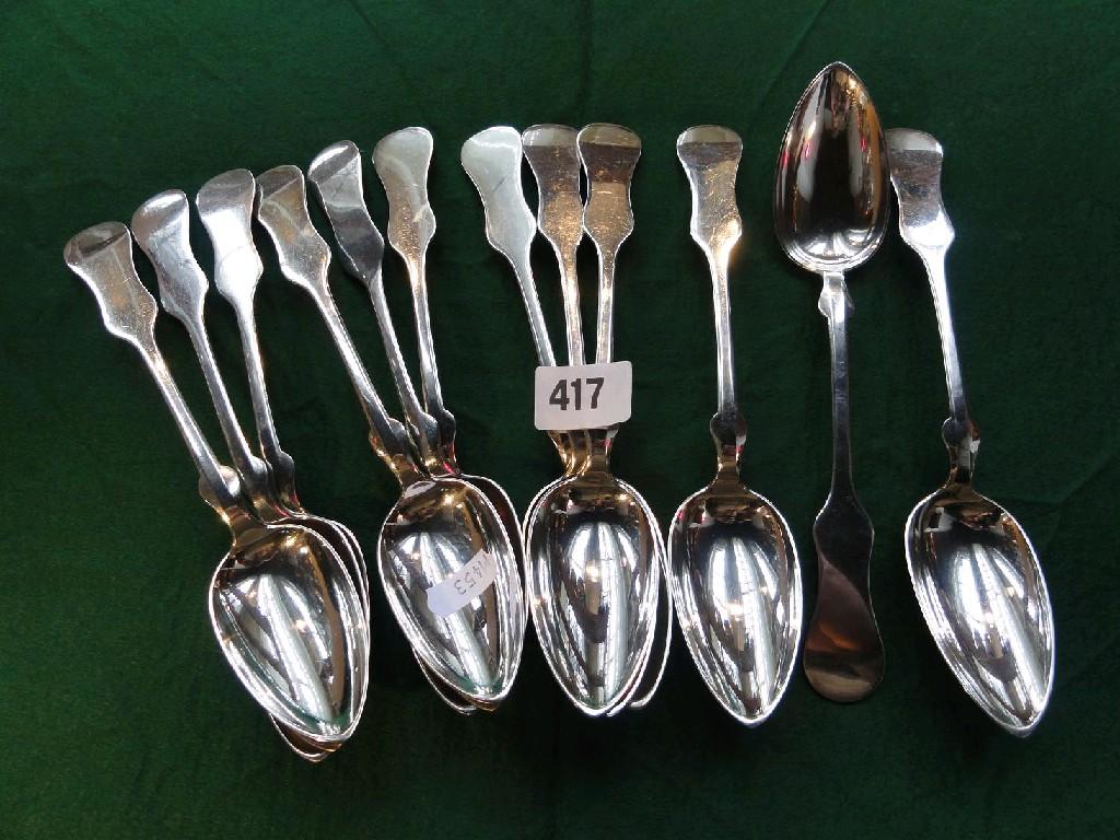 Appraisal: A set of twelve continental white metal spoons of stylised