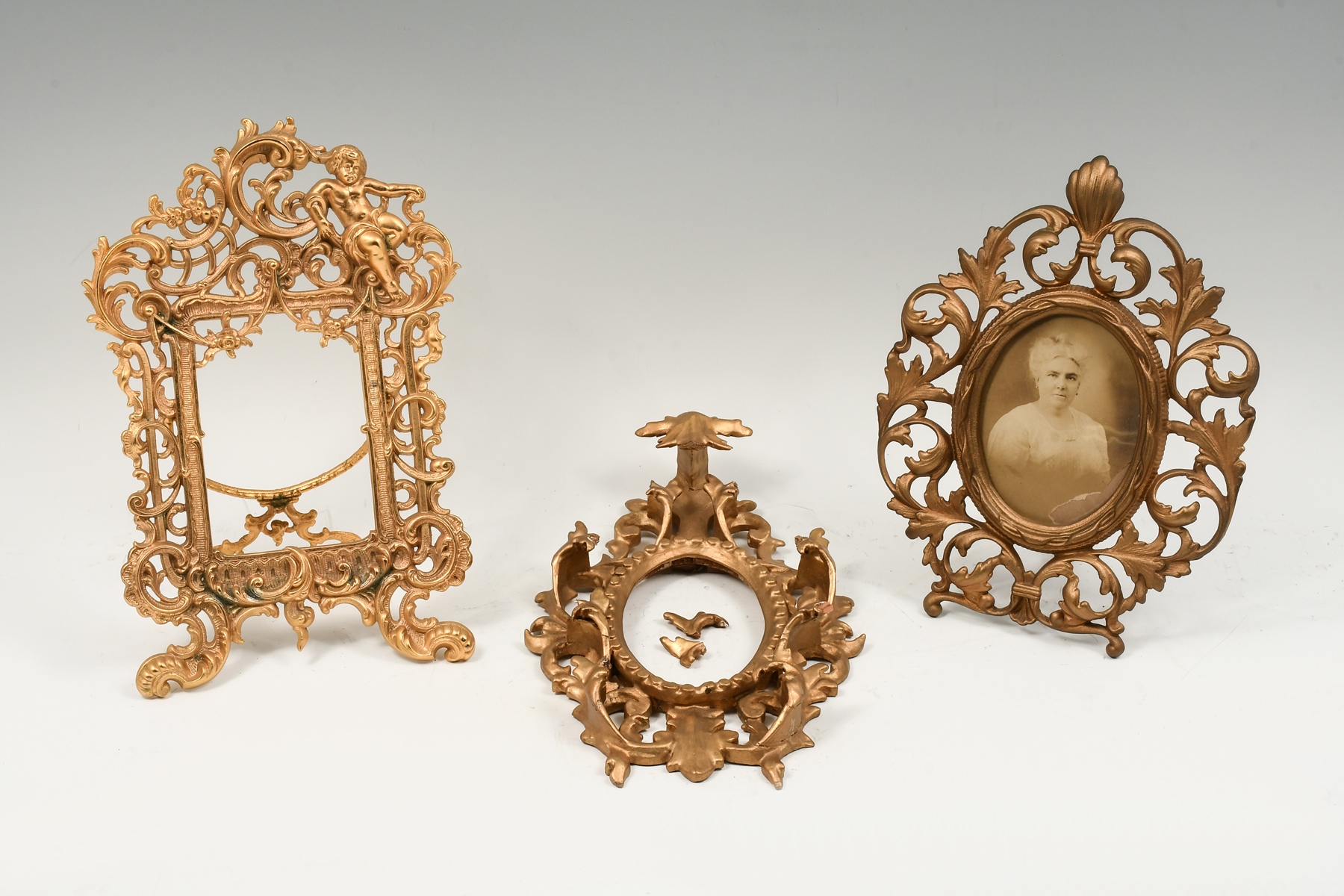 Appraisal: GILT PICTURE FRAMES Comprising - Carved wood - Metal picture