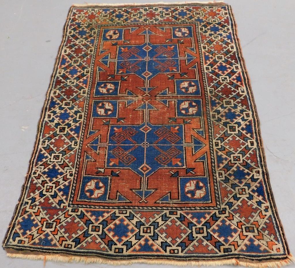 Appraisal: ANTIQUE TURKISH GEOMETRIC RUG Turkey th Century Red blue and