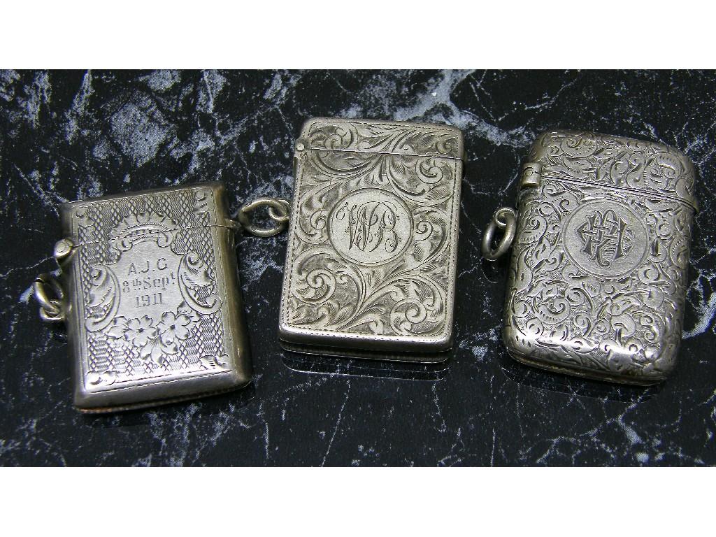 Appraisal: Three various engraved vesta cases