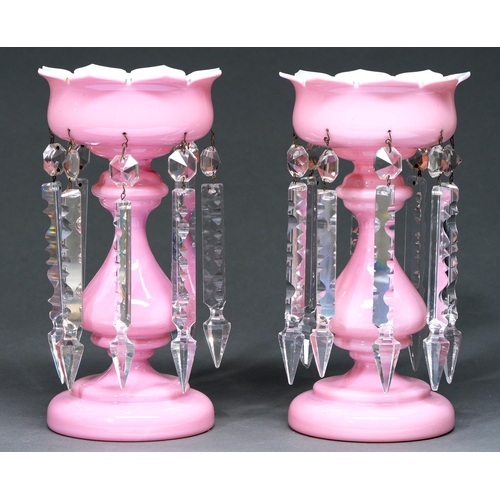 Appraisal: A pair of Victorian pink cased white glass lustres with