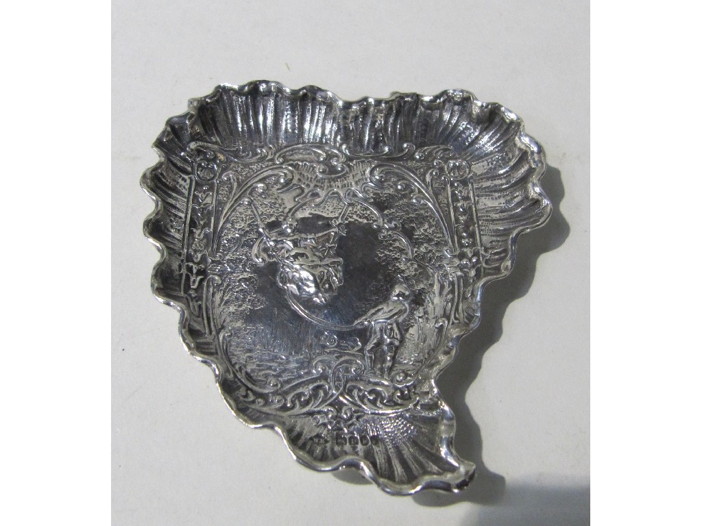 Appraisal: Silver leaf shaped dish embossed with figures on a swing