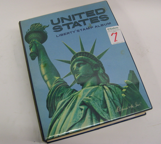 Appraisal: A UNITED STATES POSTAGE STAMP ALBUM by Liberty with more