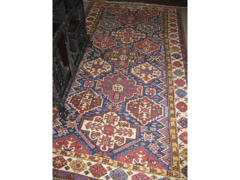 Appraisal: EARLY TH CENTURY KURDISH AREA RUG The indigo field of