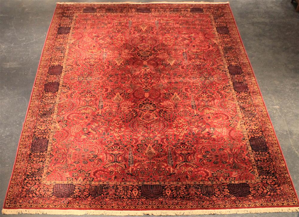 Appraisal: PERSIAN SAROUK RUG deep red field with all over designs