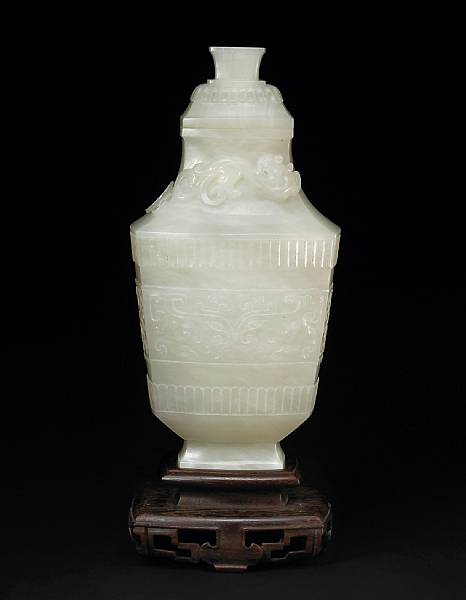 Appraisal: A fine white jade covered vase Of rectangular-sectioned hu form