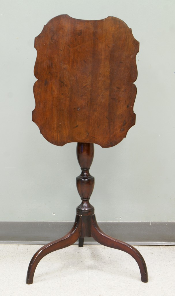 Appraisal: American mahogany Federal tilt top candlestand with intricately scalloped top