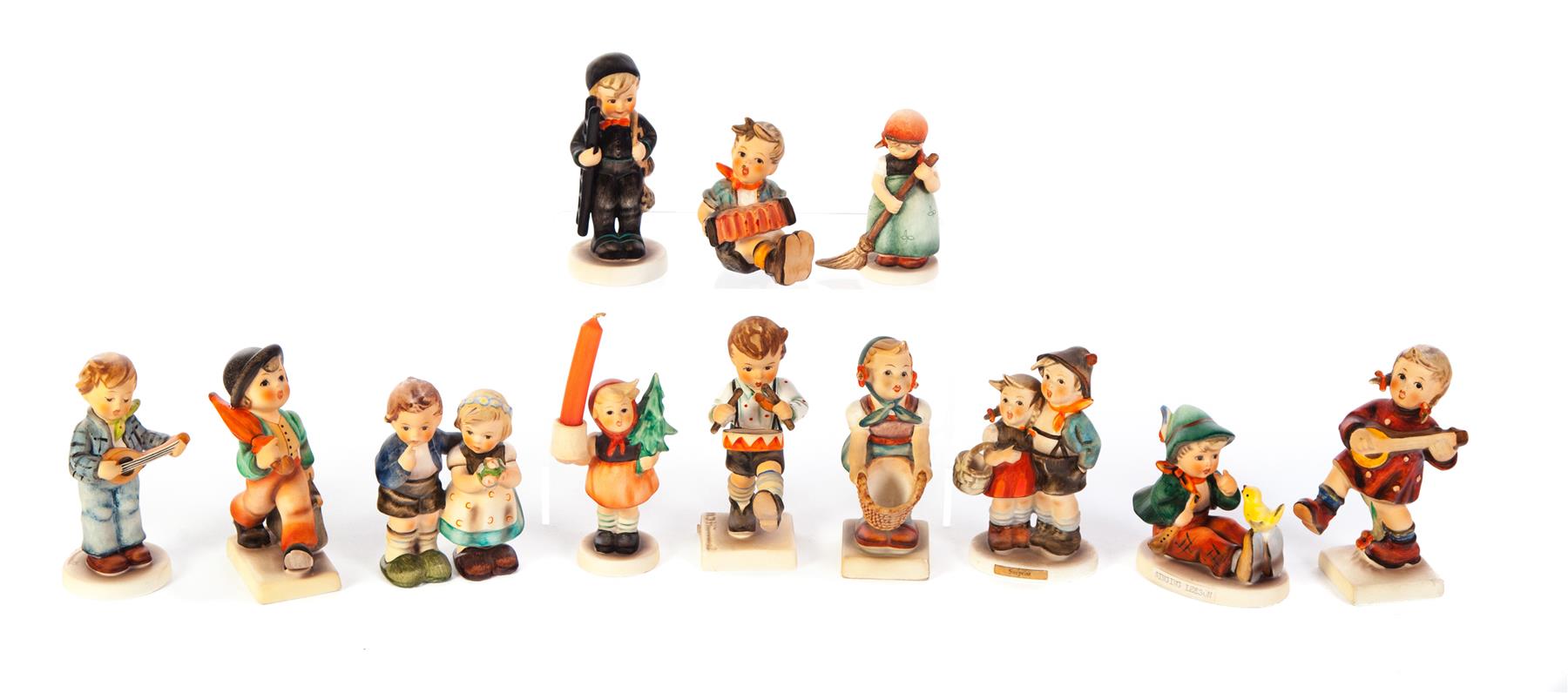 Appraisal: TWELVE HUMMEL FIGURINES Germany th century Little Drummer Happiness Singing