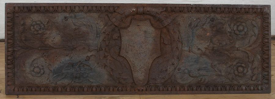 Appraisal: CAST IRON PLAQUE CIRCA Cast iron plaque having floral relief